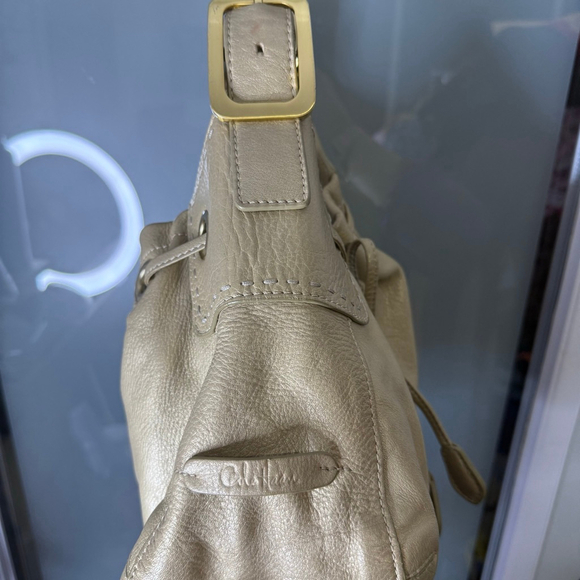 Cole Haan Metallic Beige Leather Drawstring Shoulder Bag - Picture 7 of 14